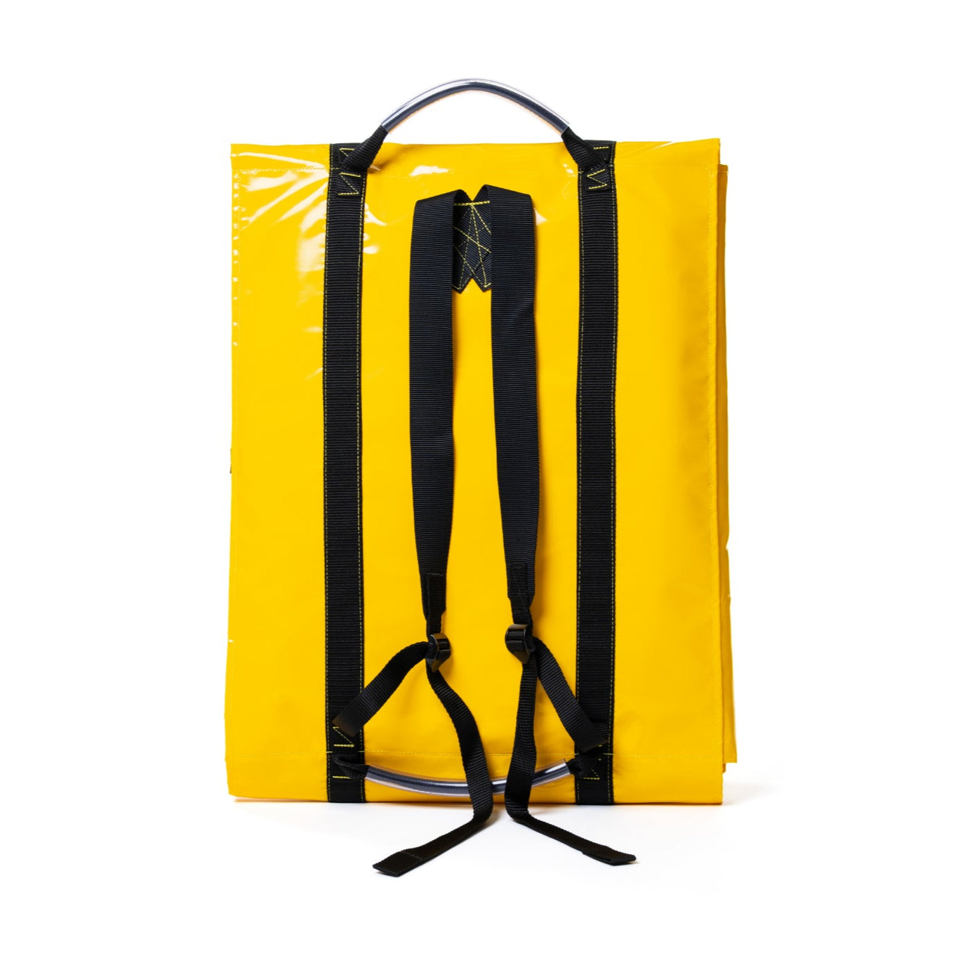 Yellow package with black straps on a white background