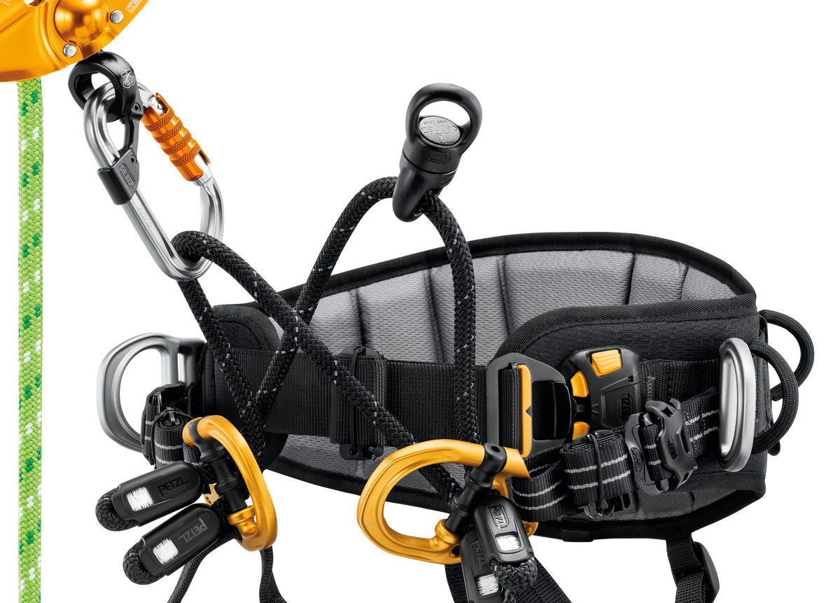 Black and orange climbing harness with carabiners on a white background