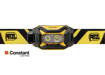 Yellow and black headlamp with Petzl branding on a white background