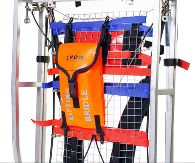 Orange lifting bridle with 'LYON' branding on a metal frame.