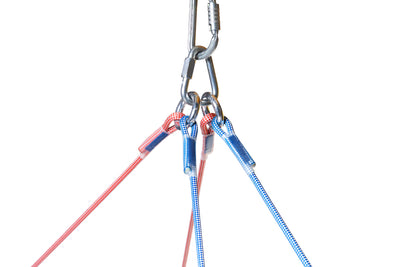 Climbing harness with pink and blue ropes on a white background