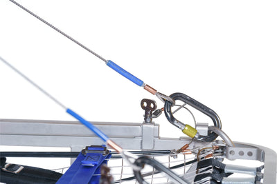 Close-up of a mechanical device with wires and components on a white background