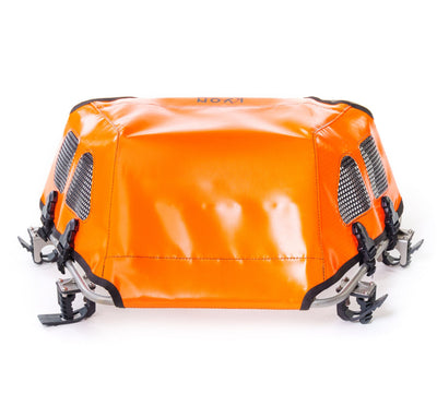 Orange suitcase with wheels on a white background