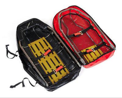 Two backpacks, one black and one red with yellow mesh compartments, on a white background.