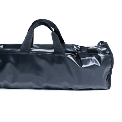 Black duffel bag with handle on a white background