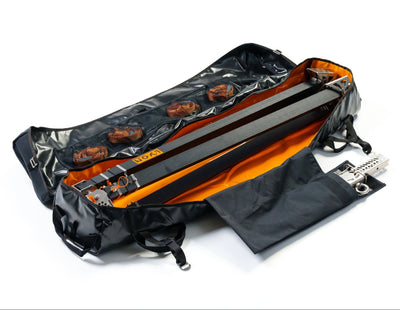 Black and orange bag with interior compartments on a white background