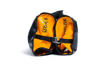 Orange and black life jacket with Obelsisk branding on a white background