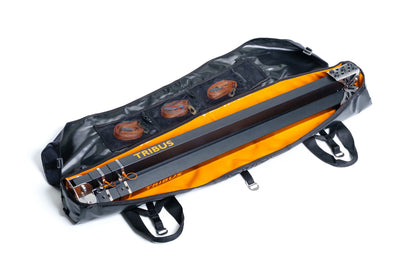 Orange and black Tribus snowboard bag on a white background