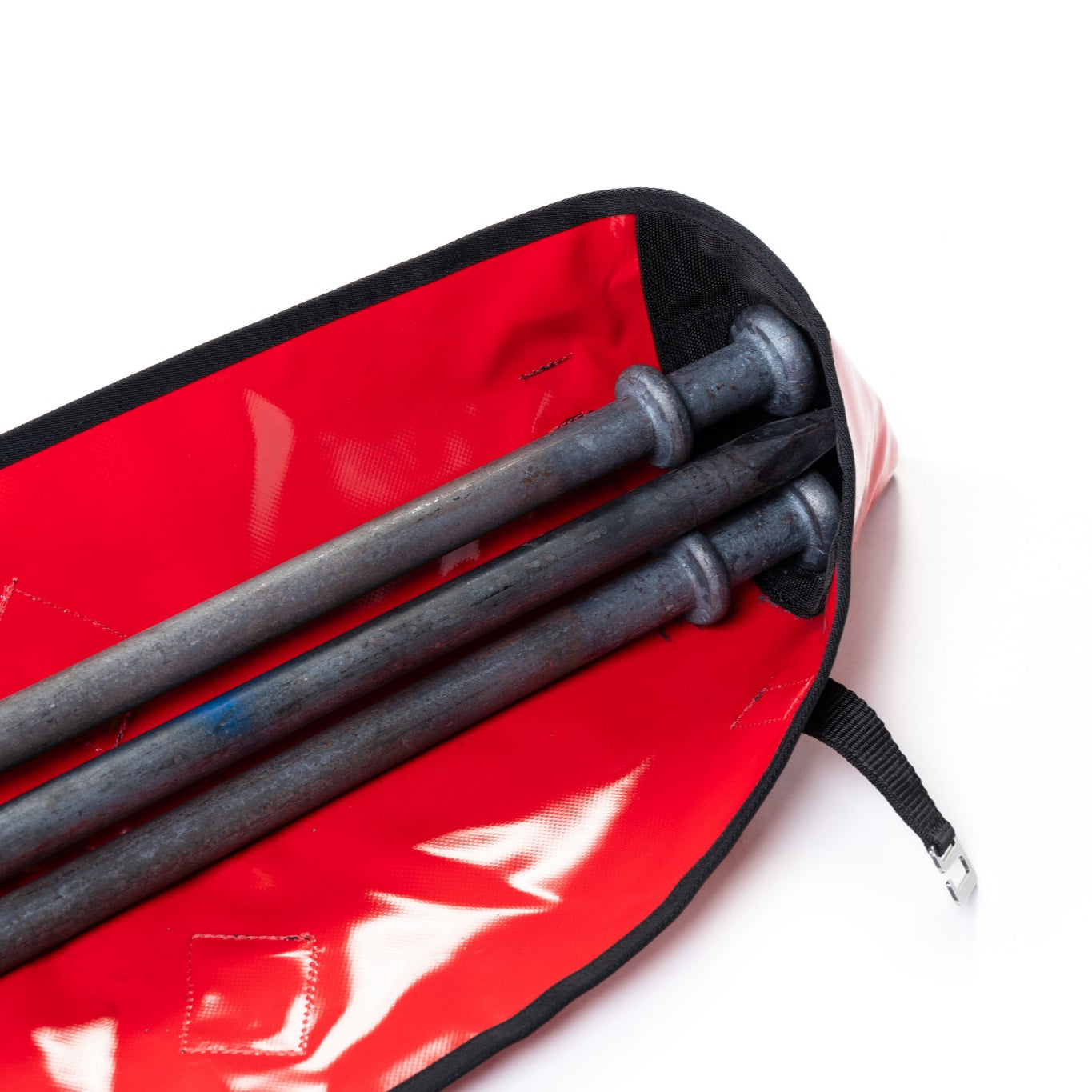 Red case with black sticks inside on a white background