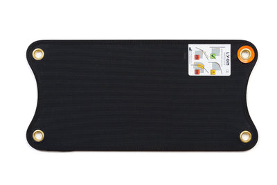 Black rectangular mat with orange corners and a label on a white background