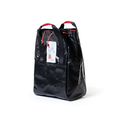 Black backpack with red accents on a white background