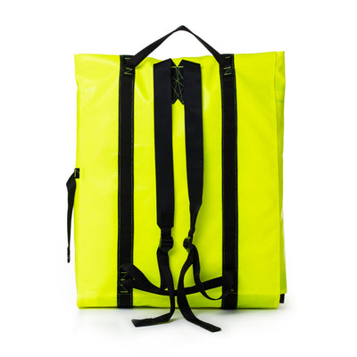 Yellow backpack with black straps on a white background