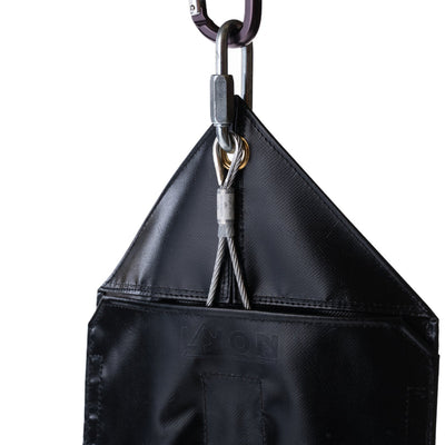 Black sandbag with a chain on a white background