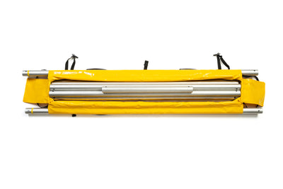 Yellow carrying case with metal rods inside on a white background