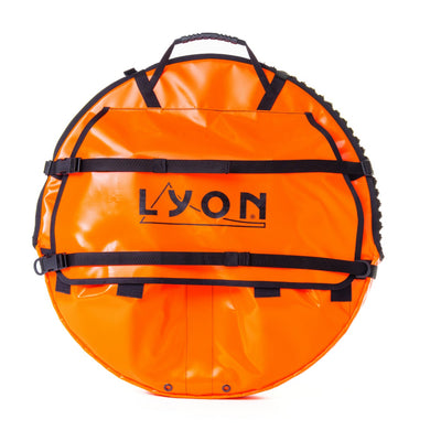 Orange snow tube with black straps and 'LYON' branding on a white background